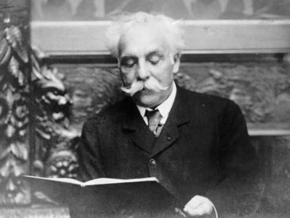 Composer Gabriel Fauré writing compositions