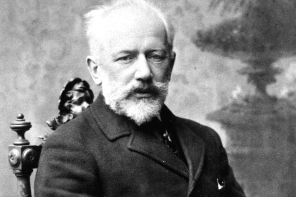Photo of Pyotr Ilyich Tchaikovsky sitting in a chair