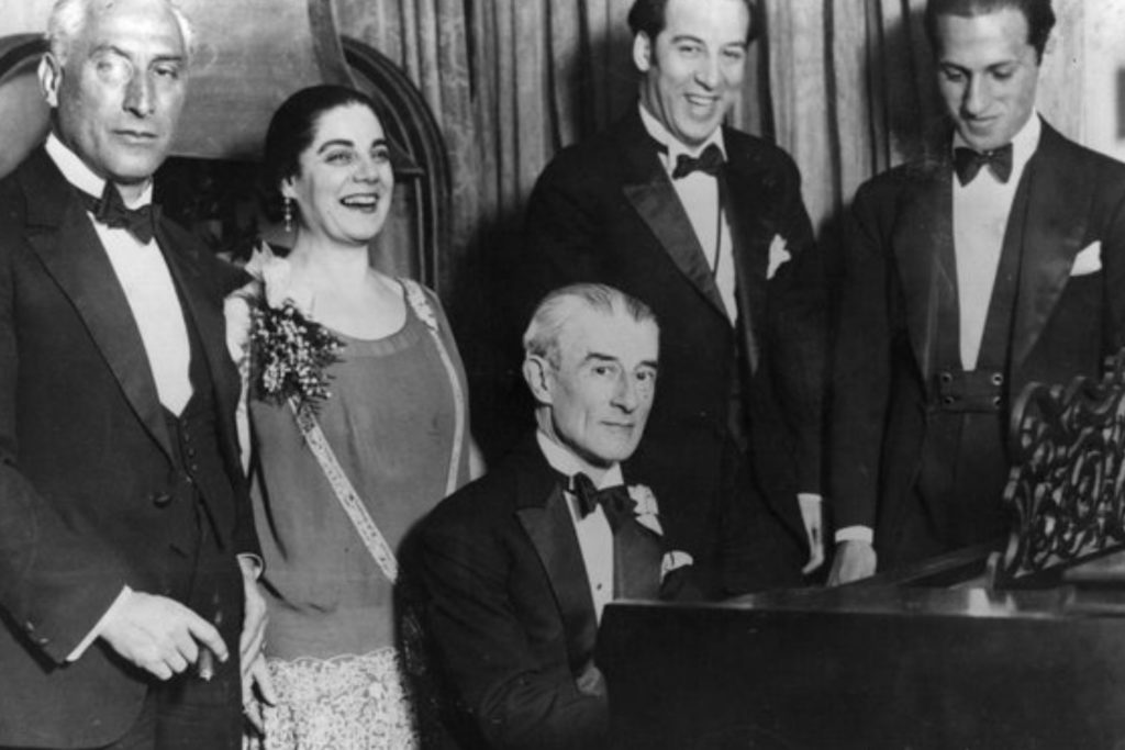 Composer, Ravel playing piano with friends