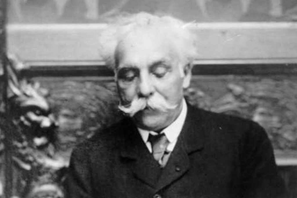 Composer Gabriel Fauré writing compositions