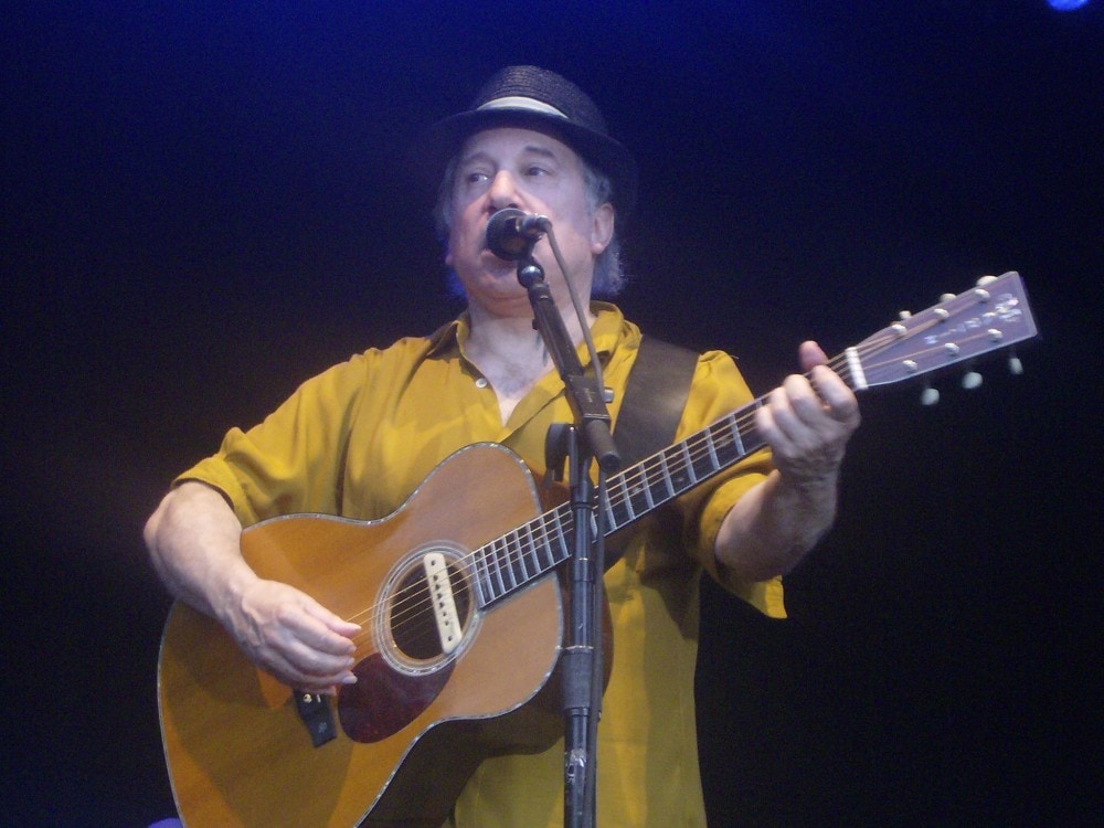 Musician Paul Simon performing on stage