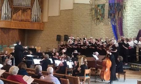 Steven A. Kennedy, conducting for the Woodbury Chorus and Orchestra