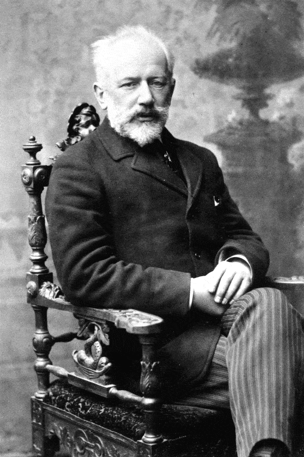 Photo of Pyotr Ilyich Tchaikovsky sitting in a chair